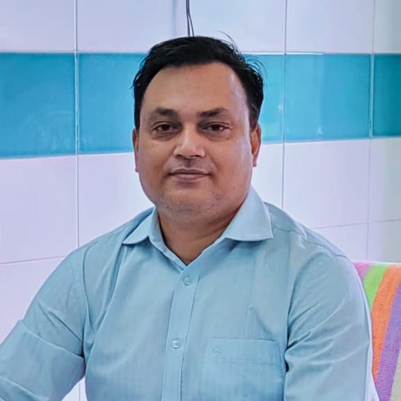 Dr. Manik Mazumder